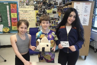 students with cabin